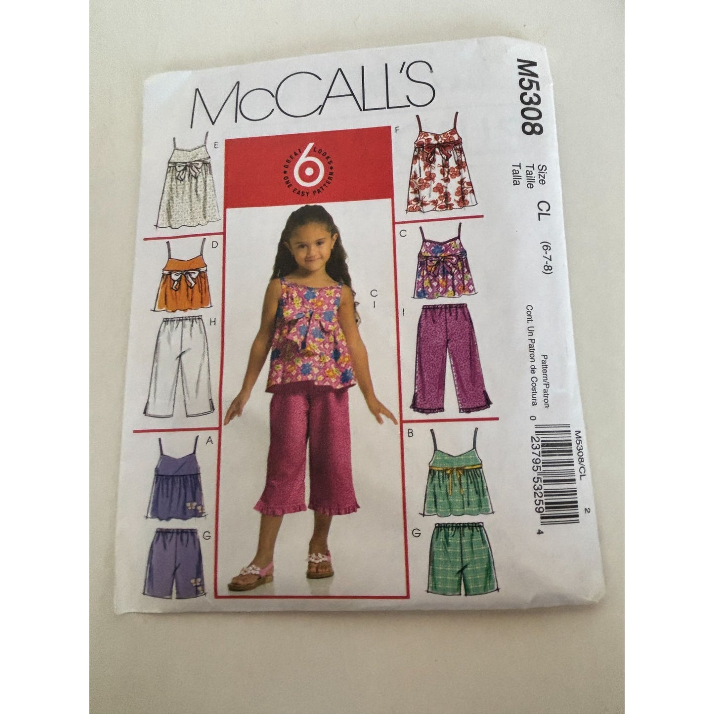 McCalls Sewing Pattern M5308 Girls Tops Dresses Shorts Capris Summer 6 7 8 Uncut