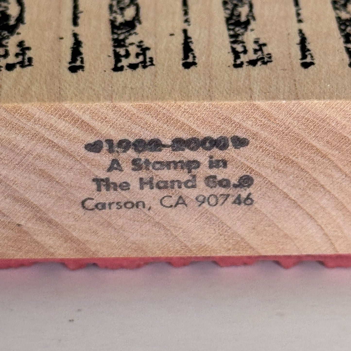 A Stamp In The Hand Rubber Stamp Distressed Lines Background Stripes Grunge Wood Texture