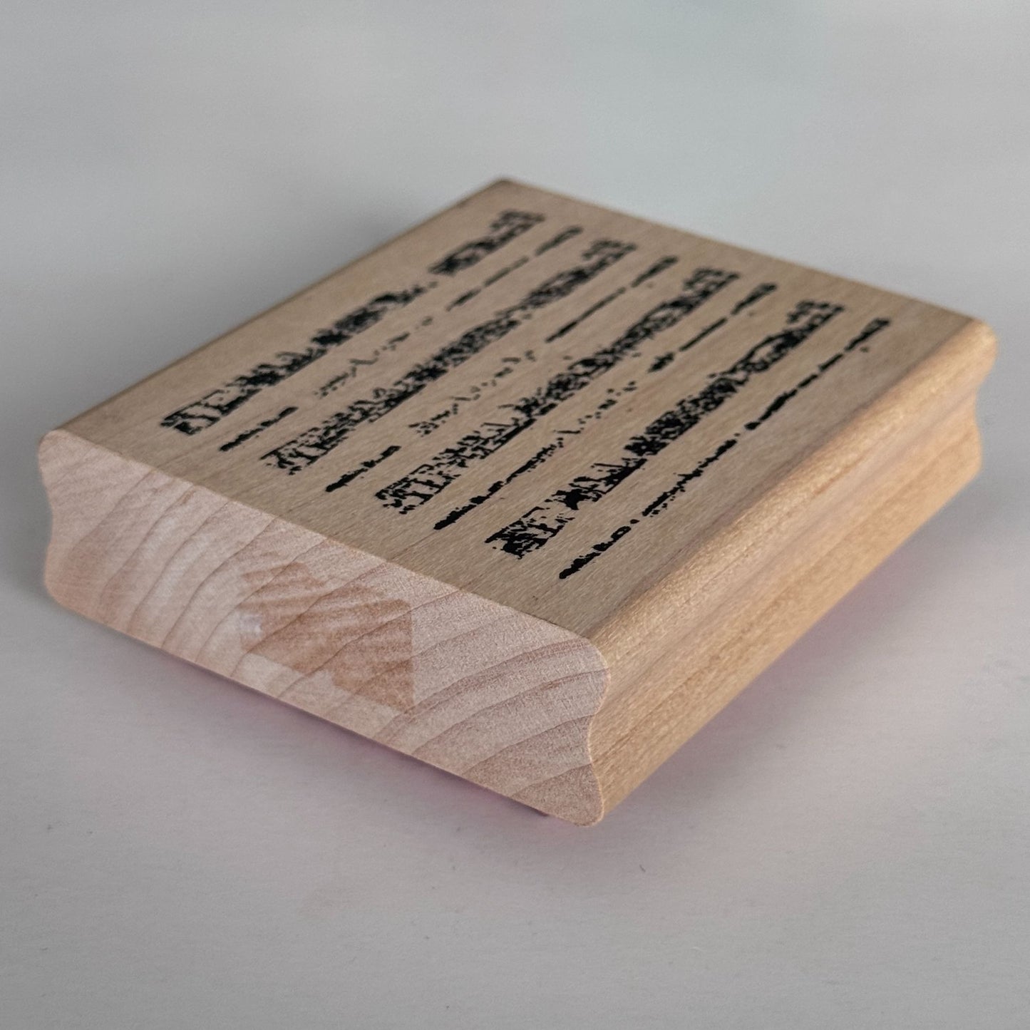 A Stamp In The Hand Rubber Stamp Distressed Lines Background Stripes Grunge Wood Texture