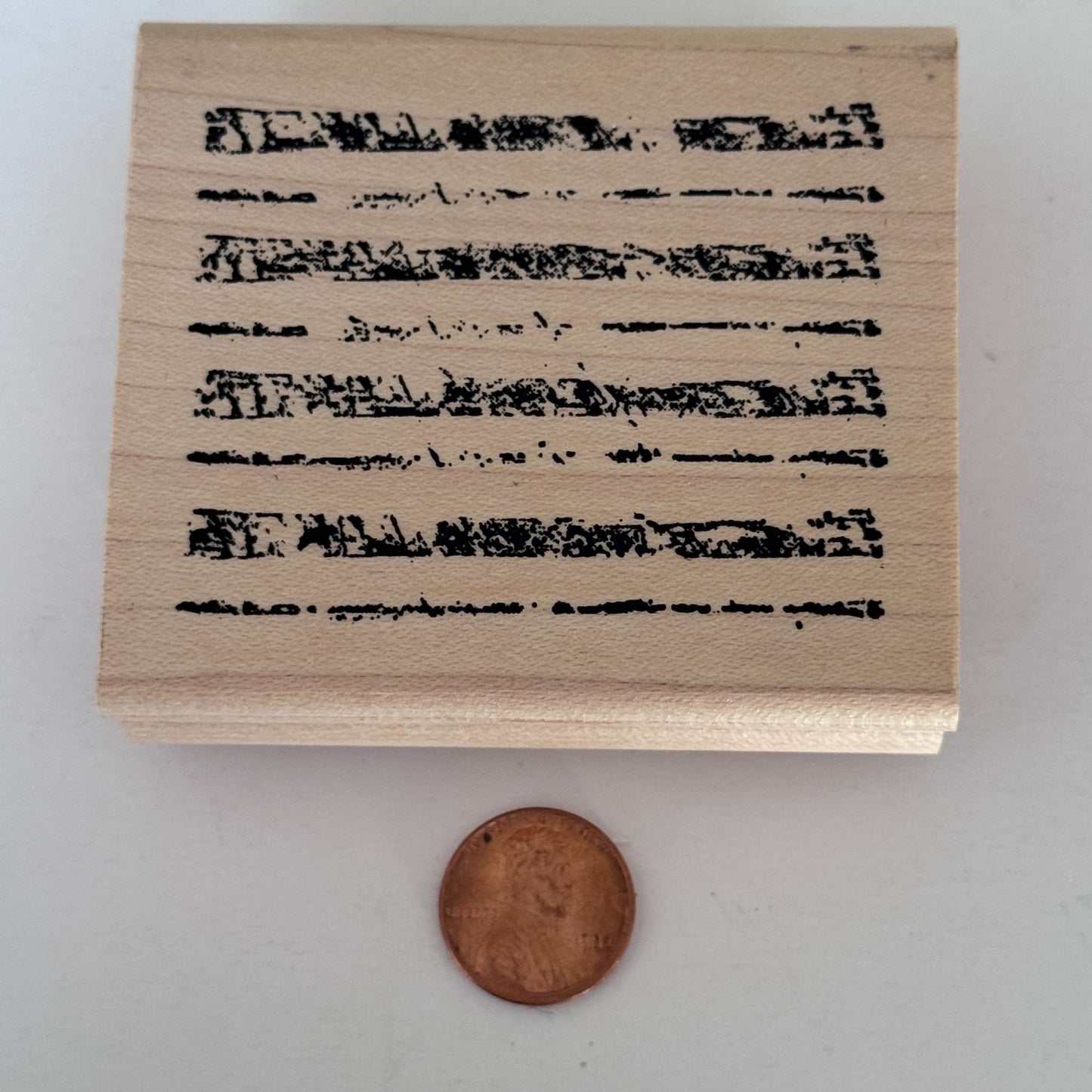 A Stamp In The Hand Rubber Stamp Distressed Lines Background Stripes Grunge Wood Texture
