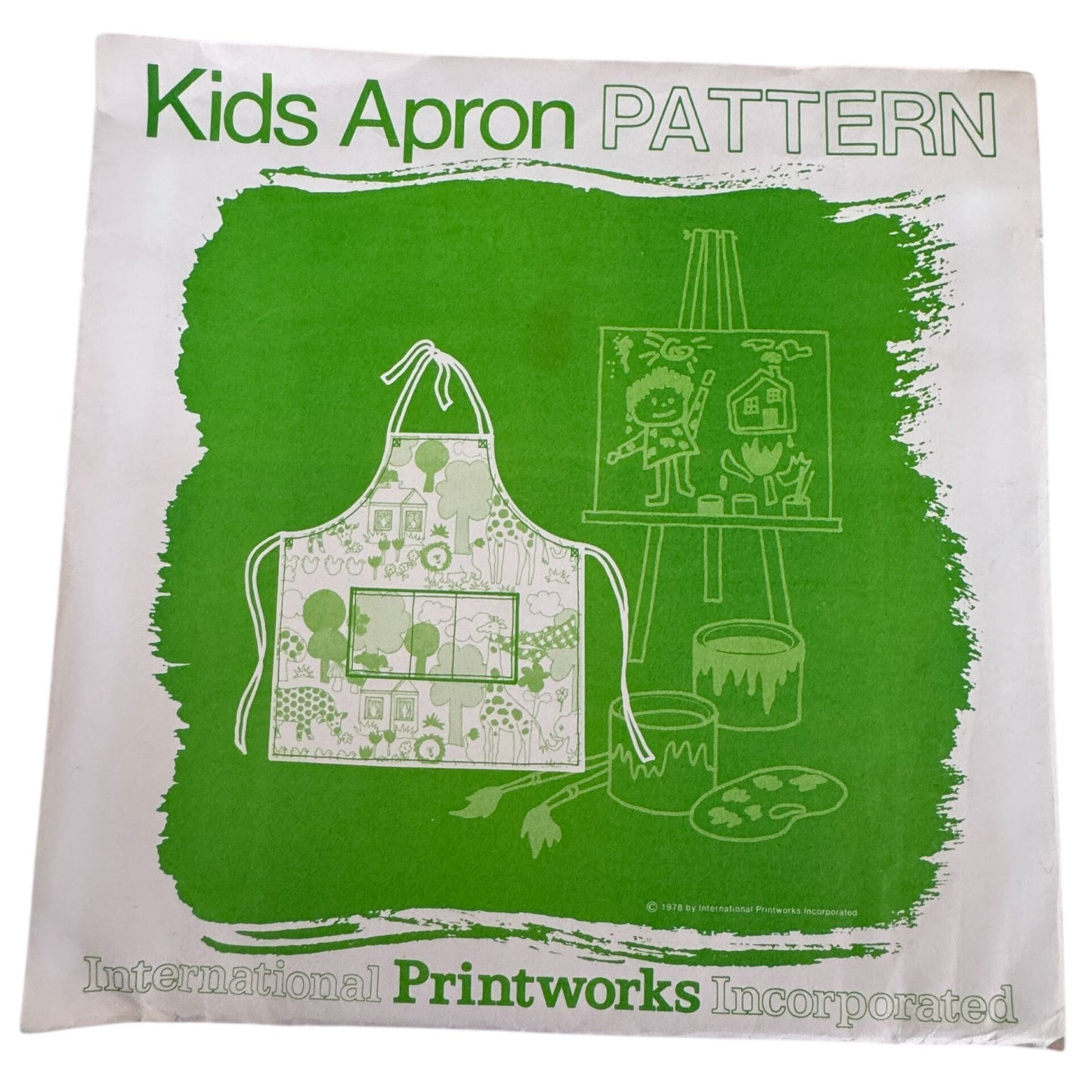 International Printworks Sewing Pattern Kids Apron 70s Artist Smock Craft 2-8 Uncut Kitchen Baking