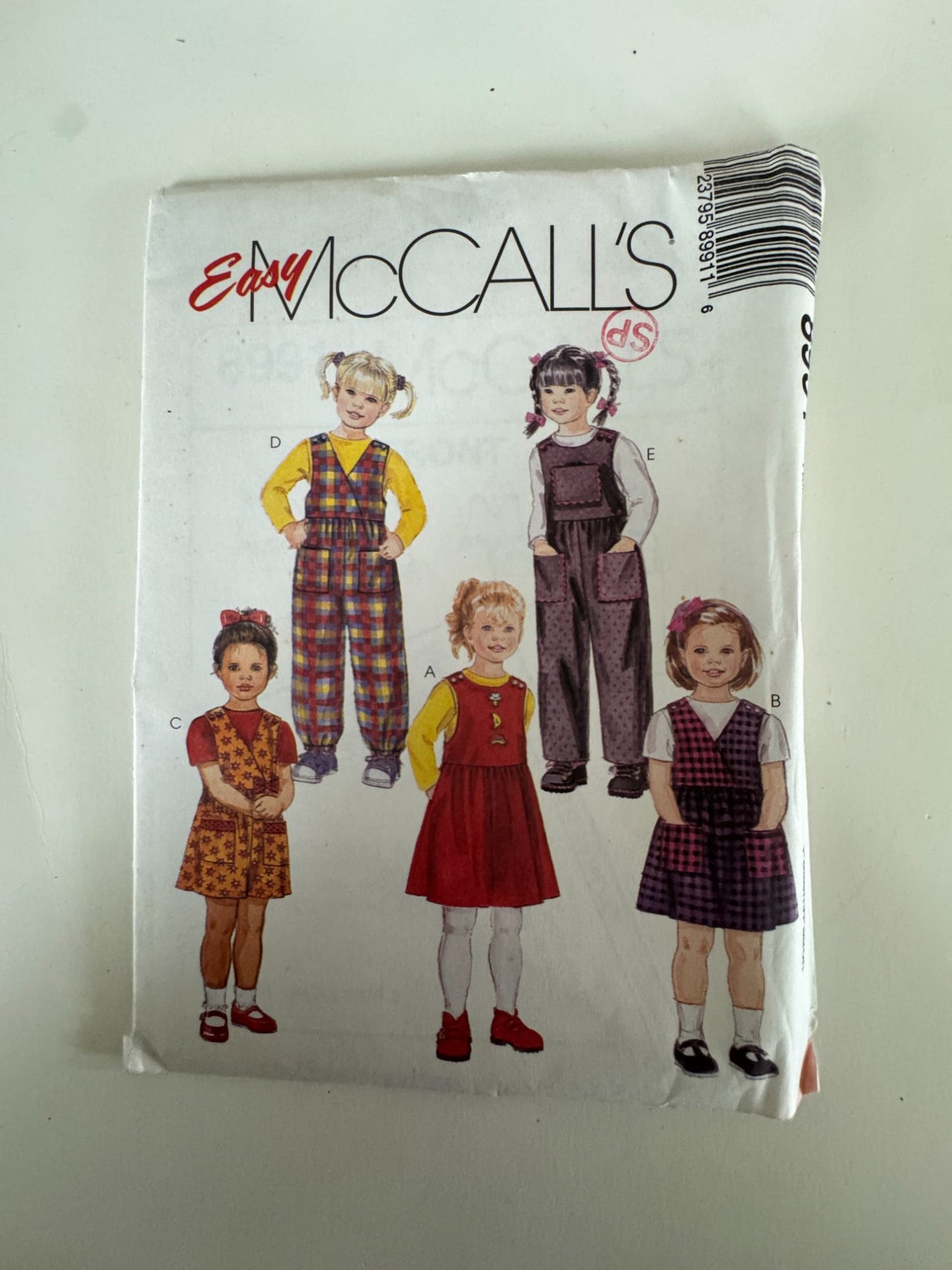 McCalls Sewing Pattern 8991 Jumper and Jumpsuit Girls 2 3 4 Casual Easy Uncut